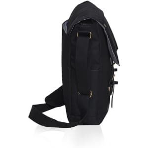 A black messenger bag with a shoulder strap, featuring a flap and a logo. Minimalist design and sleek profile.