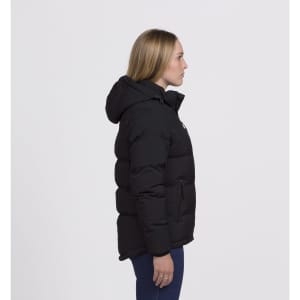 A side view of a black puffer jacket featuring a hood and zippered pockets. The model stands in profile.