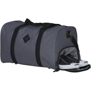 A grey duffle bag with a separate compartment for shoes, featuring a black strap and a small logo.