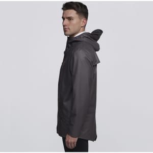 A rain jacket in dark grey, featuring a hood and a sleek design. Includes a logo on the fabric.