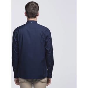 A navy blue button-up shirt with a classic collar and long sleeves, featuring a logo. Back view is shown.