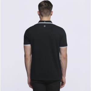 A black polo shirt with contrasting white trim and a branding logo on the back.