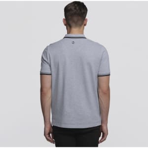 A grey polo shirt with contrasting trim and a logo on the back, featuring a classic collar and short sleeves.