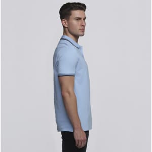 A light blue men's polo shirt featuring a collar with contrasting stripes, presented in a side view.