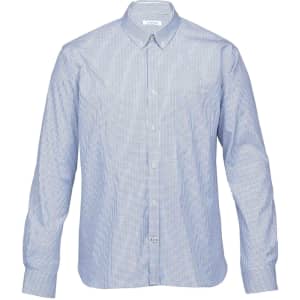 A button-up shirt in blue and white check pattern with long sleeves and a collar. Features a logo.