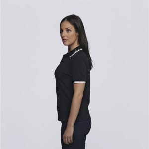 A black polo shirt with white striped detailing on the collar, modelled by a woman from the side.