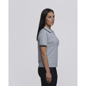 A grey women's polo shirt featuring a classic collar and contrasting trim. The shirt has a logo on it.
