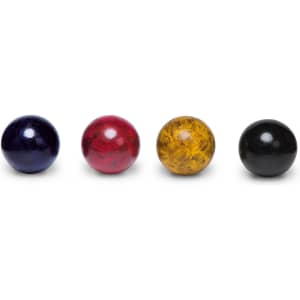 Four coloured croquet balls in purple, red, yellow, and black, arranged in a row on a white background.