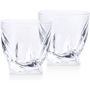 A set of two clear crystal whisky glasses with a unique angular design, featuring a slight frosted finish.