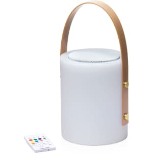 A white speaker lamp with a leather handle and a remote control, featuring a sleek cylindrical design.