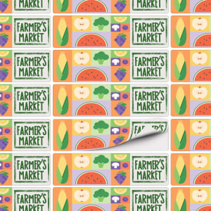 A patterned sheet of stickers featuring various fruits and vegetables in vibrant colours with a logo.