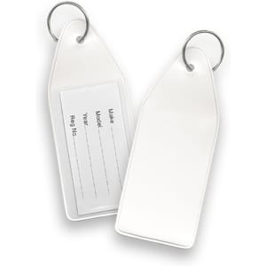 A white vinyl key tag with a keyring, featuring a blank area for writing information on both sides.
