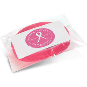 A pink silicone wristband packaged in a transparent bag, featuring a logo and informative label.