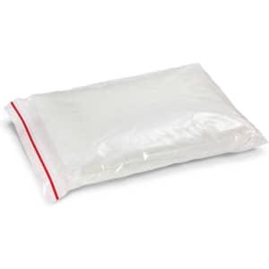 A sealed bag containing an emergency raincoat. The bag is transparent with a red stripe along the top.
