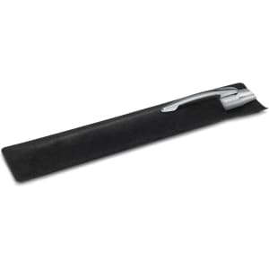 A sleek metal pen with a silver finish, resting on a black suede pouch.