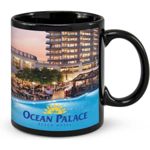 A black coffee mug featuring a vibrant image of a hotel and pool scene, complete with a logo.
