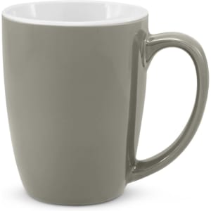 A green ceramic coffee mug with a smooth finish and a white interior, featuring a sturdy handle and subtle branding.