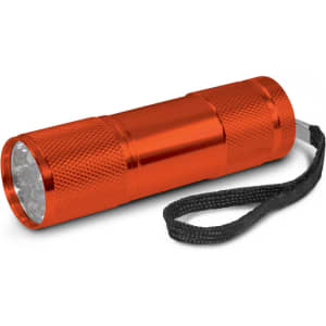 An orange Nebula Torch designed as a compact flashlight, featuring a textured grip and a wrist strap for easy carrying.