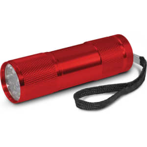 A compact red torch with a textured body and a wrist strap, featuring multiple LED lights at the front.