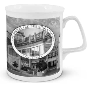 A white Chroma Bone China coffee mug featuring a black-and-white design of a brewery building and logo.