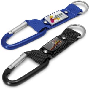 A blue and black carabiner key ring featuring a logo on each strap, one in fabric and the other in metal.