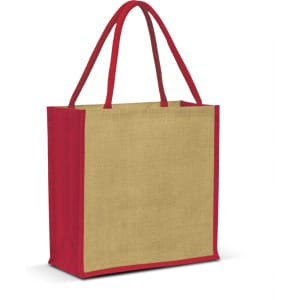 A jute tote bag in natural tan with bright red handles and trim. The bag has a simple design with no visible logos.