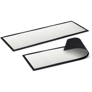 A large counter mat with a black border, featuring a smooth, white surface.