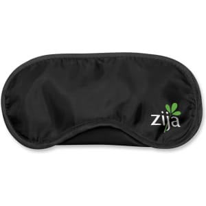 An eye mask featuring a sleek black design with a green logo that reads "zija."