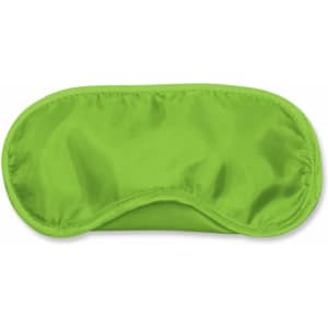 A green eye mask with a smooth surface and contoured shape, designed for comfort and light blocking.