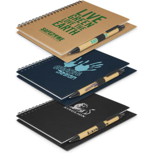 Three assorted notebooks in brown, black, and blue with pens, featuring different designs and a logo on each cover.