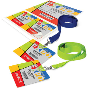 Name badges in bright colours of yellow, green, and red with lanyards, displayed alongside a sheet of printed badges.