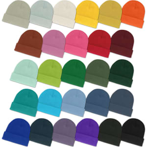 A selection of Everest Beanies in various colours, including pastels, dark tones, and vibrant hues, arranged in rows.