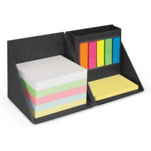 A desk organiser in black with sections for sticky notes and vibrant coloured index flags in pink, yellow, green, and blue.