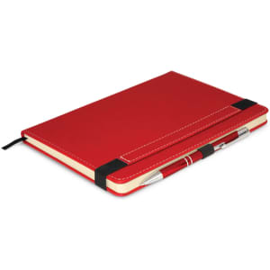 A red notebook with a pen secured on the side, featuring a black elastic band.