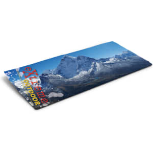 A blue outdoor blanket featuring a mountain landscape design and a logo.