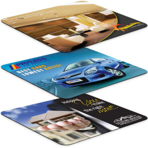 A set of three promotional mouse mats featuring colourful designs and various images for office use.