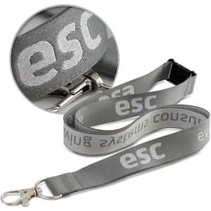 A grey Jacquard lanyard with a clip and branding along its length.