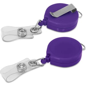 A purple retractable ID holder with a clip and clear strap for attaching identification cards. It features a branding logo.