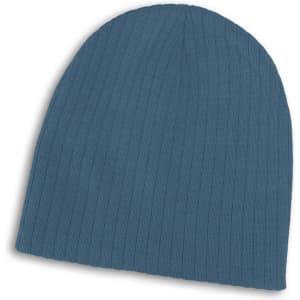 A blue cable knit beanie featuring ribbed texture and a simple design. It has a logo on the side.