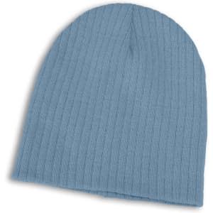 A Nebraska Cable Knit Beanie in a soft blue hue, featuring a ribbed texture for warmth and comfort.