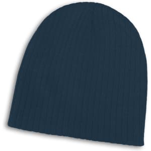 A navy blue cable knit beanie featuring a ribbed texture and a logo on the side.