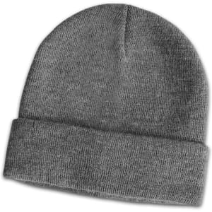 A grey wool blend beanie with a folded cuff and a smooth texture, featuring a logo on the side.