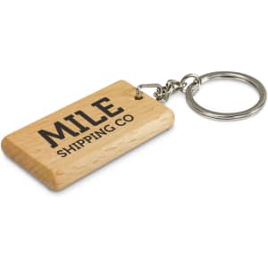A rectangular wooden key ring with a metal chain and a logo. It features a natural wood finish.