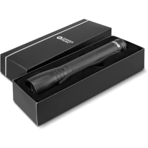 A black Swiss Peak 10W Cree torch in a sleek black box with a fitted interior. The box features a logo.