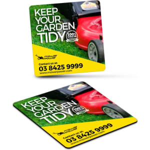 A square fridge magnet featuring a vibrant green grass background and a lawn mower, with a logo and contact information.