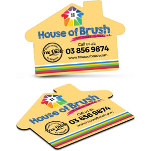A house-shaped fridge magnet in yellow with colourful stripes and a logo. Features contact information.