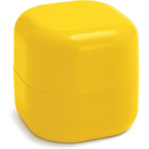 A yellow, square lip balm container with a glossy finish and a small logo on the side.