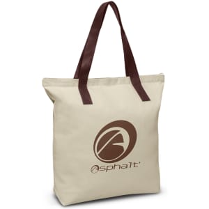 A cream tote bag with brown handles and a logo at the front.