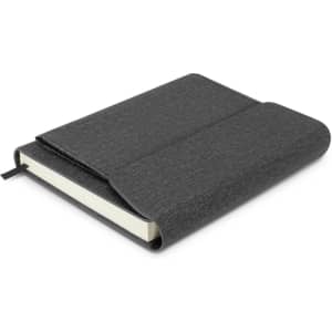 A grey notebook with a textured cover and a ribbon bookmark, featuring a flap closure and blank pages.
