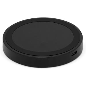 A wireless charger in a sleek black circular design, featuring a textured surface and a USB-C port for connectivity.